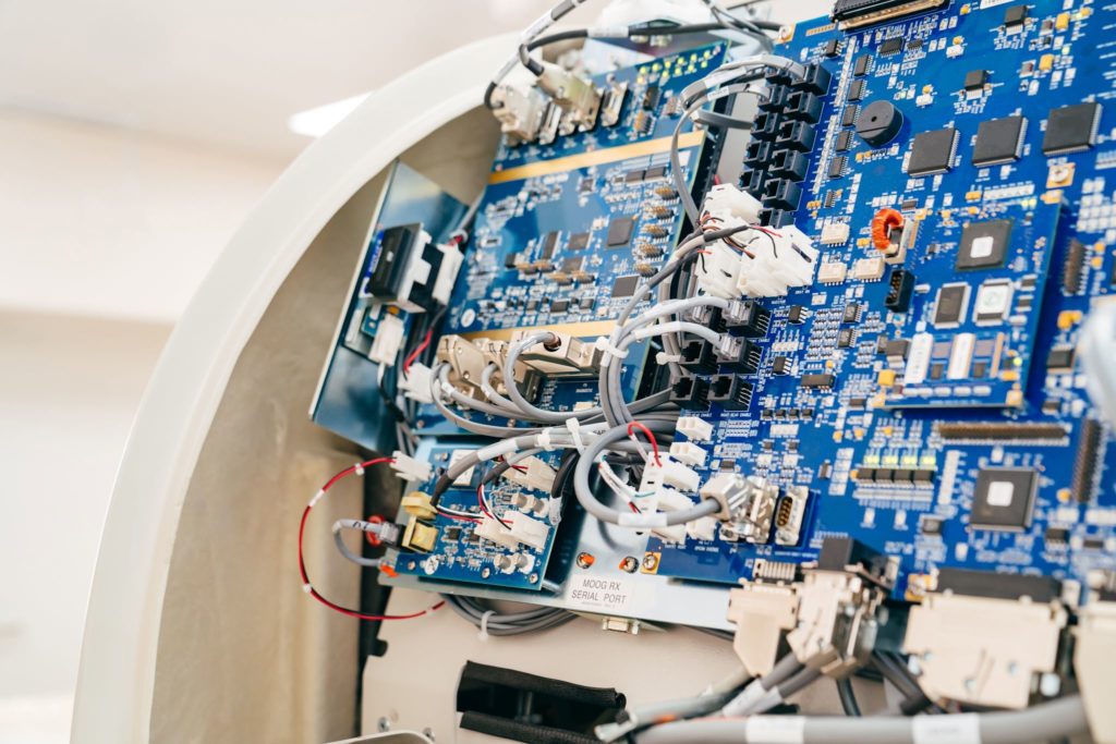 Inner medical PCB assembly exposed in a clincial setting for repair.